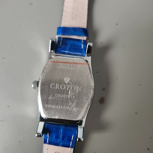 Croton diamond bezel Blue genuine leather bracelet.